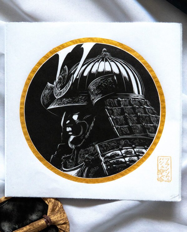 Linogravure Japonaise d’un Casque de Samurai au sourire glaçant